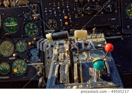 Center console and throttles in an old airplane 49505217