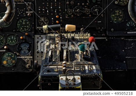Center console and throttles in an old airplane Center console and throttles in an old airplane 49505218