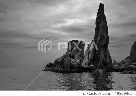 black and white photo of small rocks on the 49509463