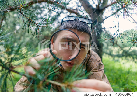 Picture of man with magnifying glass Picture of man with magnifying glass 49509964