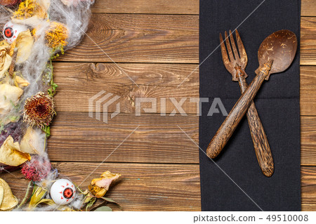 Halloween table with dry flowers 49510008