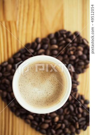 Good Morning. Coffee To Go. Coffee Cups With Cover and Coffee Beans on Wooden Table Backound Good Morning. Coffee To Go. Coffee Cups With Cover and Coffee Beans on Wooden Table Backound 49512054