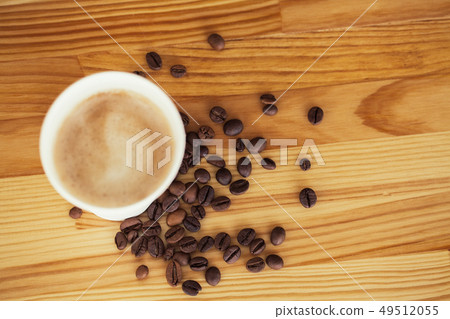 Good Morning. Coffee To Go. Coffee Cups With Cover and Coffee Beans on Wooden Table Backound Good Morning. Coffee To Go. Coffee Cups With Cover and Coffee Beans on Wooden Table Backound 49512055