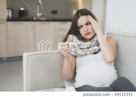 Girl Measures Temperature. Pregnant Headache. Girl Measures Temperature. Pregnant Headache. 49512335