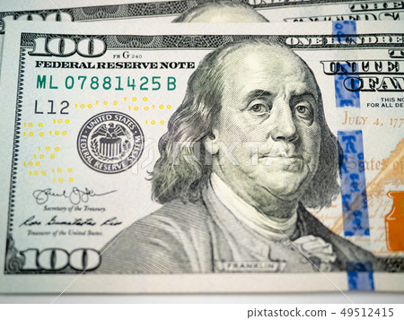 Close up of new hundred dollar bill Close up of new hundred dollar bill 49512415