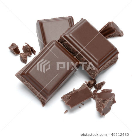 Dark organic chocolate pieces isolated on white background 49512480