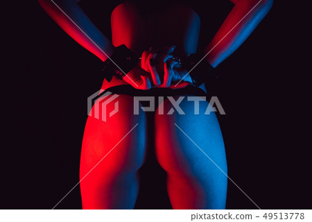 sexy erotic ass girl in a Thong with handcuffs 49513778