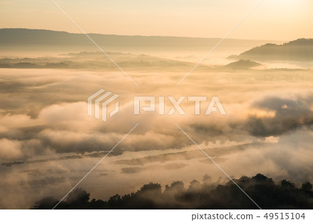 Sunrise and the mist in winter morning 49515104