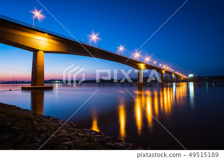 Thai-Laos Friendship Bridge on sunset background Thai-Laos Friendship Bridge on sunset background 49515189