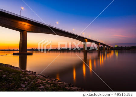 Thai-Laos Friendship Bridge on sunset background 49515192