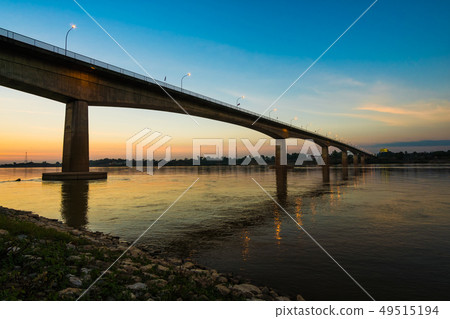 Thai-Laos Friendship Bridge on sunset background Thai-Laos Friendship Bridge on sunset background 49515194