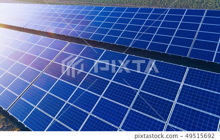 Aerial drone view on solar panels on solar farm. Aerial drone view on solar panels on solar farm. 49515692