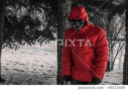Man in death mask in the park 49515889