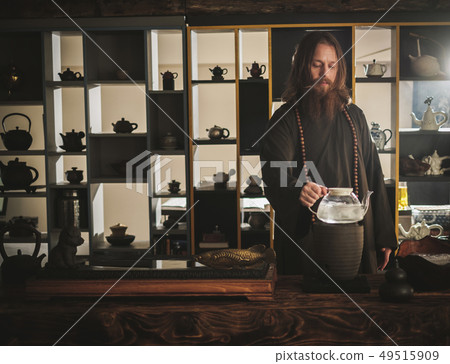 Tea ceremony is perfomed by tea master Tea ceremony is perfomed by tea master 49515909