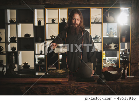 Tea ceremony is perfomed by tea master Tea ceremony is perfomed by tea master 49515910
