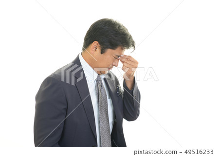 A tired businessman 49516233