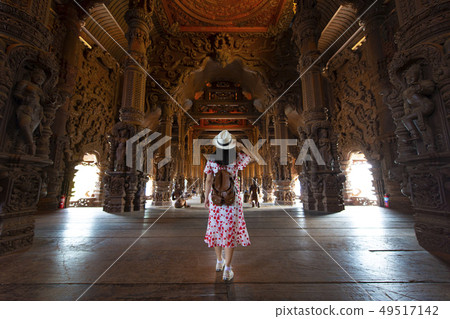 Tourist is traveling inside Sanctuary of truth  49517142