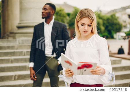 businesswoman with partner in a city 49517848