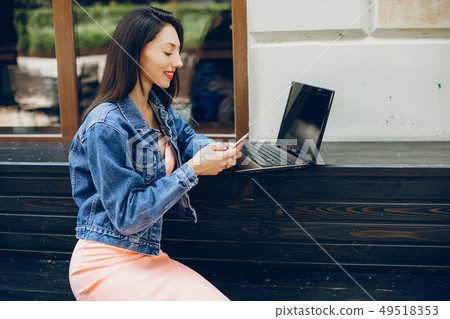 Elegant lady with laptop 49518353