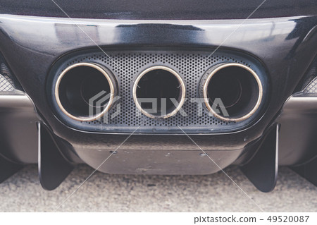 Rear view car Exhaust Close up. Luxury sport car. Rear view car Exhaust Close up. Luxury sport car. 49520087