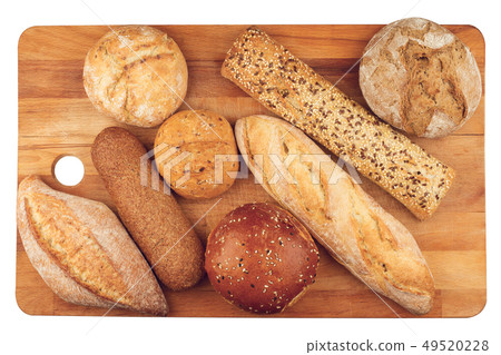 different types of bread on wooden kitchen cutting 49520228