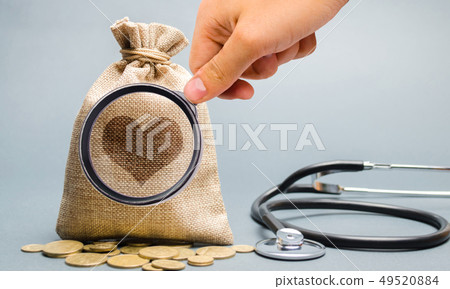 Money bag and heart image with stethoscope. 49520884