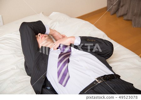 A man who goes home and sleeps A man who goes home and sleeps 49523078
