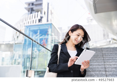 Businesswoman tablet computer Businesswoman tablet computer 49527983