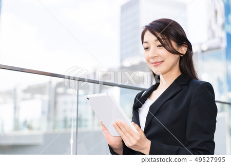 Businesswoman tablet computer Businesswoman tablet computer 49527995