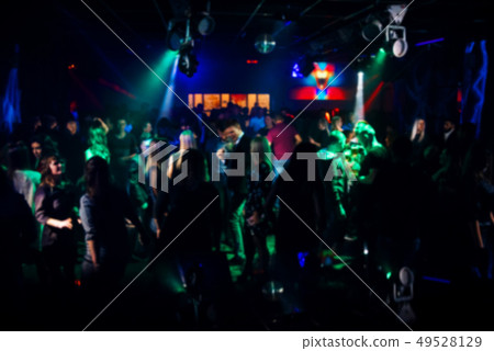 blurred crowd of people at a party at a live concert blurred crowd of people at a party at a live concert 49528129