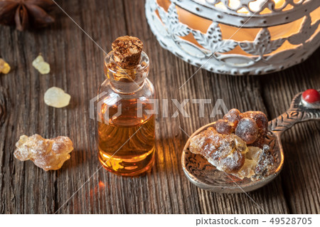 A bottle of frankincense essential oil with 49528705