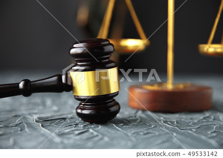 Judge gavel and legal book on wooden table, justice and law Judge gavel and legal book on wooden table, justice and law 49533142