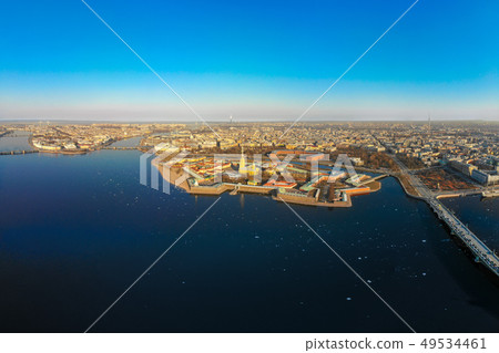 Beautifull aerial view of the Petropavlovsky fortress in sunny spring day. Golden tall spire of Beautifull aerial view of the Petropavlovsky fortress in sunny spring day. Golden tall spire of 49534461