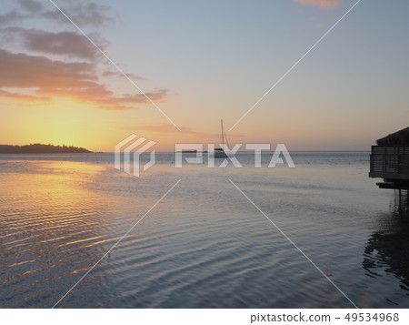 Tahiti sunset and water cottage Tahiti sunset and water cottage 49534968