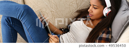 Black ordinary female designer workplace 49536450
