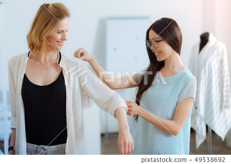 Delighted brunette doing her job with pleasure 49538692