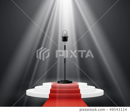 Entertainment industry. Microphone stand on stage round podium. Pedestal platform illuminated Entertainment industry. Microphone stand on stage round podium. Pedestal platform illuminated 49543114