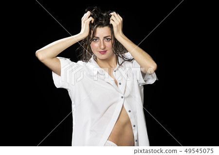 beautiful woman in shirt 49545075