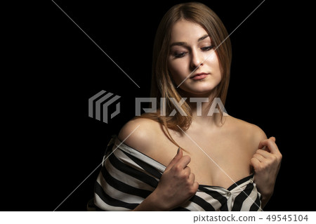 portrait of beautiful woman in low key portrait of beautiful woman in low key 49545104