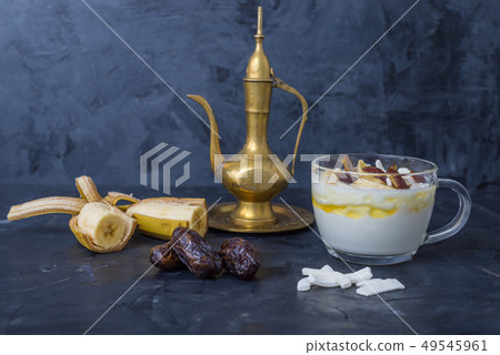 Iftar or Suhoor snack of dates with yogurt Iftar or Suhoor snack of dates with yogurt 49545961