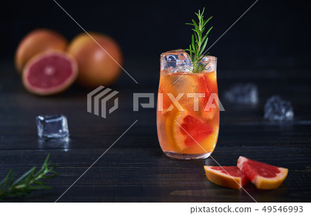 Refreshing cold cocktail with grapefruit and Refreshing cold cocktail with grapefruit and 49546993