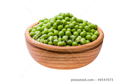 Green peas in wooden bowl 49547073