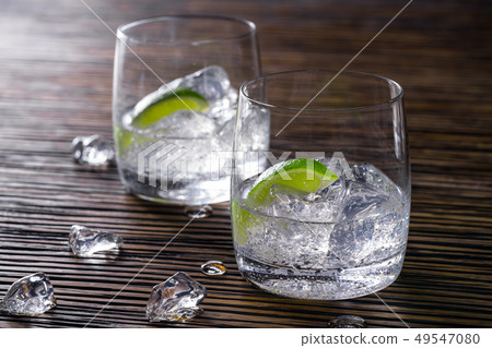 Two glasses with transparent drinks 49547080
