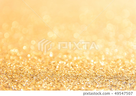 Defocused gold glitter background. Gold abstract Defocused gold glitter background. Gold abstract 49547507