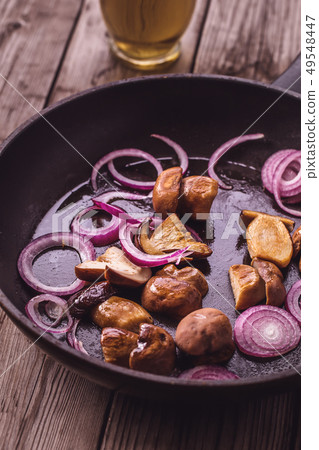 Roasted porcini mushrooms 49548447