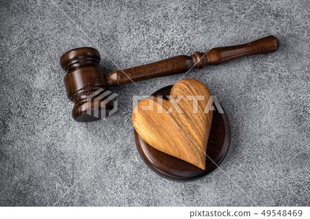 Gavel and wooden heart 49548469