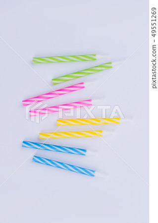 Colorful Birthday candles, top view. 49551269