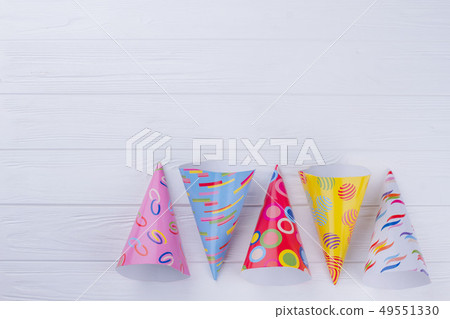 Party hats made from paper, top view. Party hats made from paper, top view. 49551330
