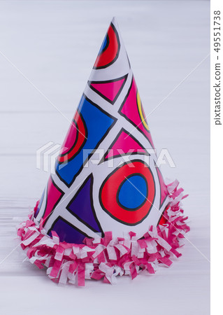 Colored party hat on white background. Colored party hat on white background. 49551738
