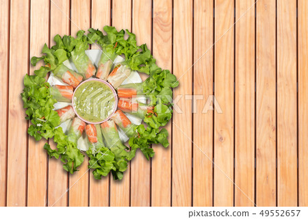 Top view salad rolls in dish on the wooden 49552657